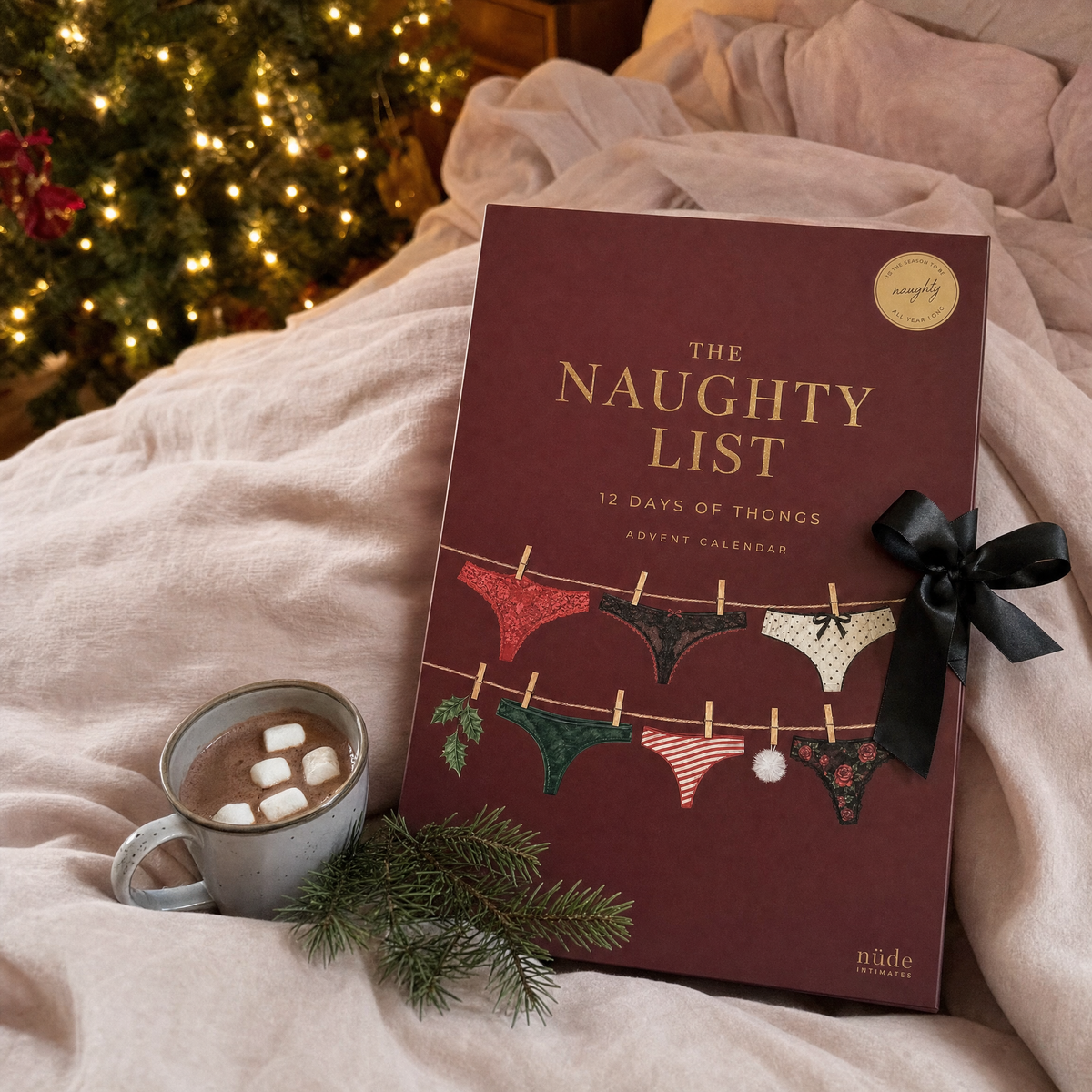 Thongmas advent calendar on a cozy bed by the Christmas tree